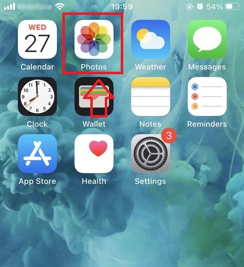 Open the Photos app and the video will appear here.